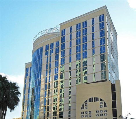 View from ground level looking up at a tall building